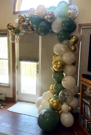Balloons Surrounding an outside door Up frame and down
